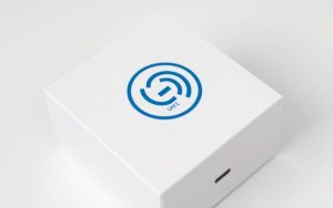 Qi certification logos on smartphone packaging